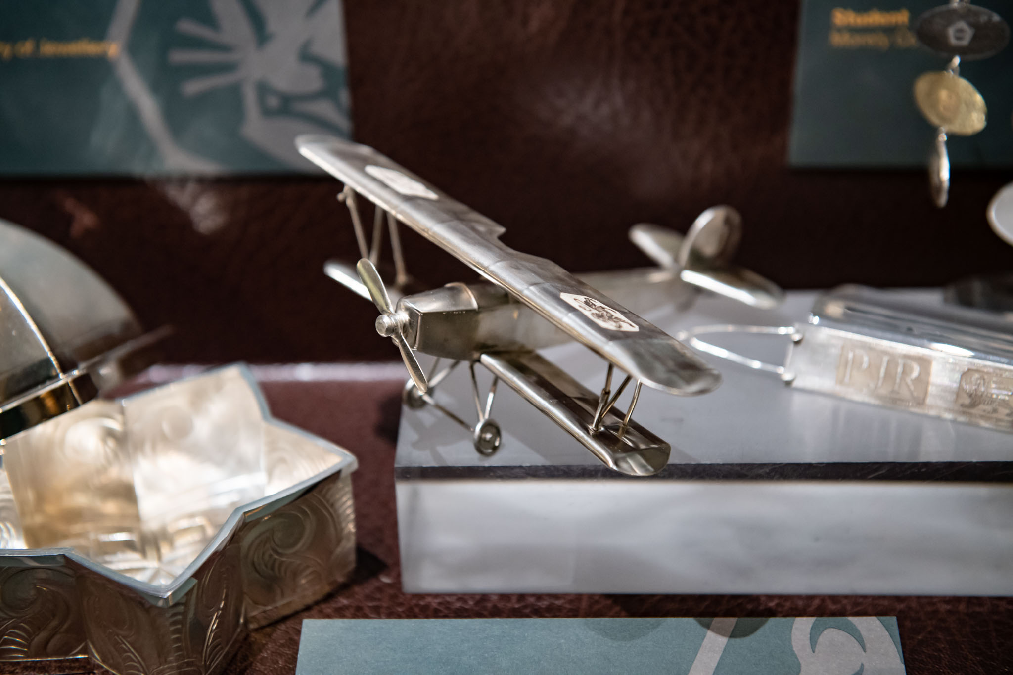 The judges felt this piece used the hallmarks in a clever way and for a submission by a student, judges were impressed by the level of craftsmanship of this entry. Peter Roberts, ‘Remembrance’ – Silver Model Plane. Student - Ms. A. Hamilton Creative Jewellery