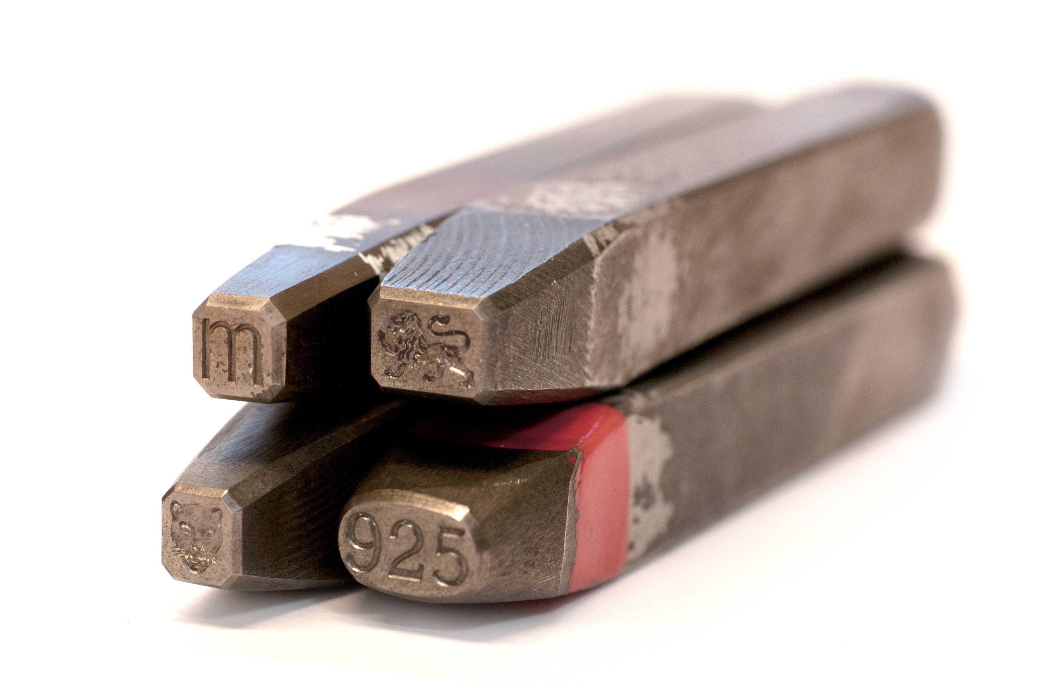 Punches, clockwise from top left, date letter, traditional fineness, millesimal fineness, townmark