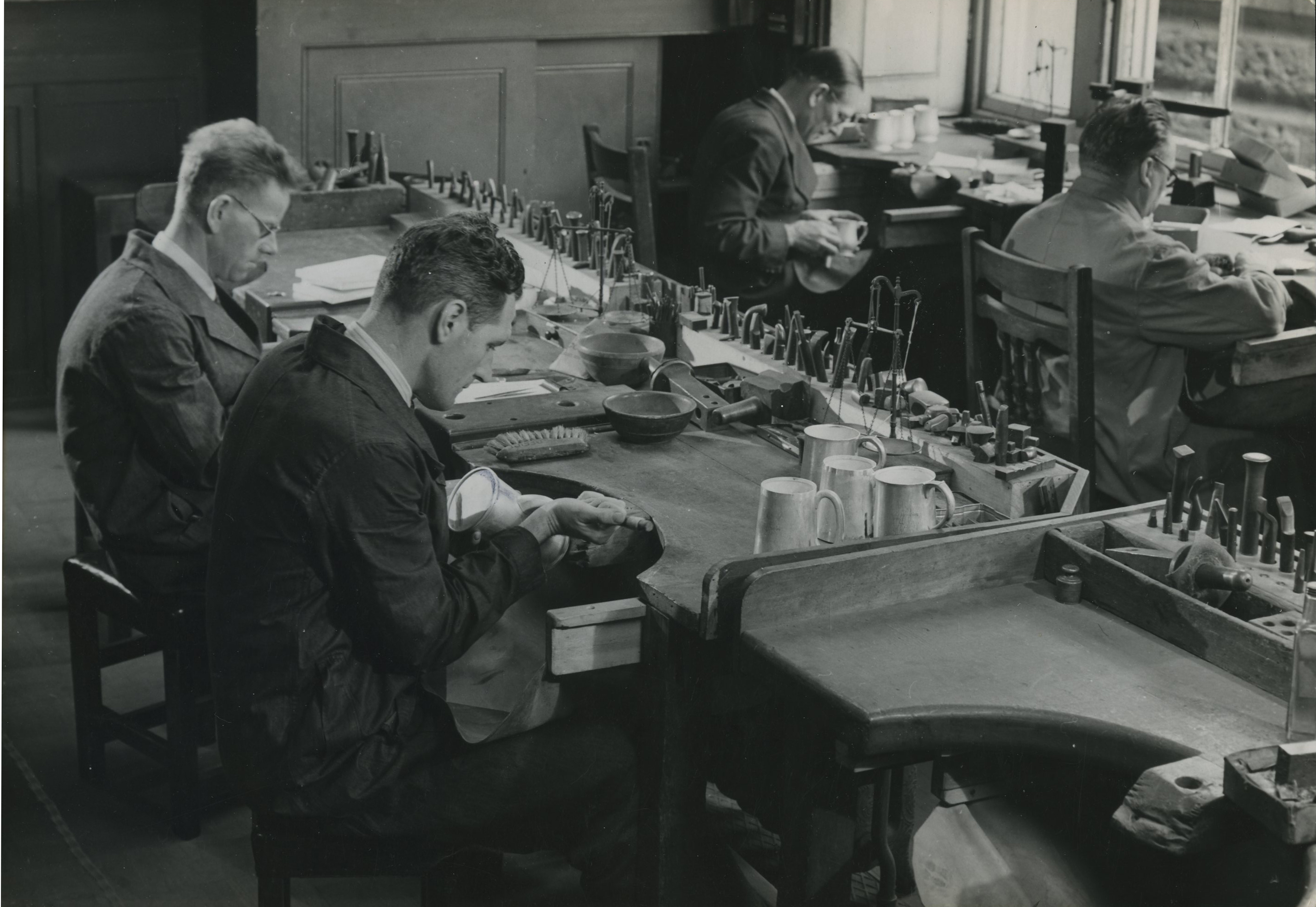 Taking scrapings from silver articles for assaying
