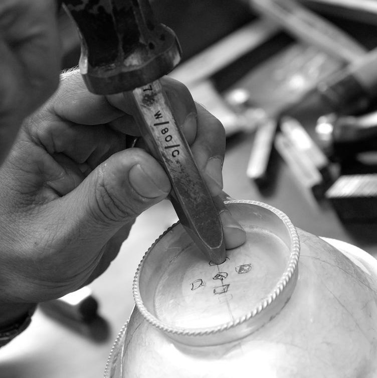 Hallmarking a bowl with a straight neck punch