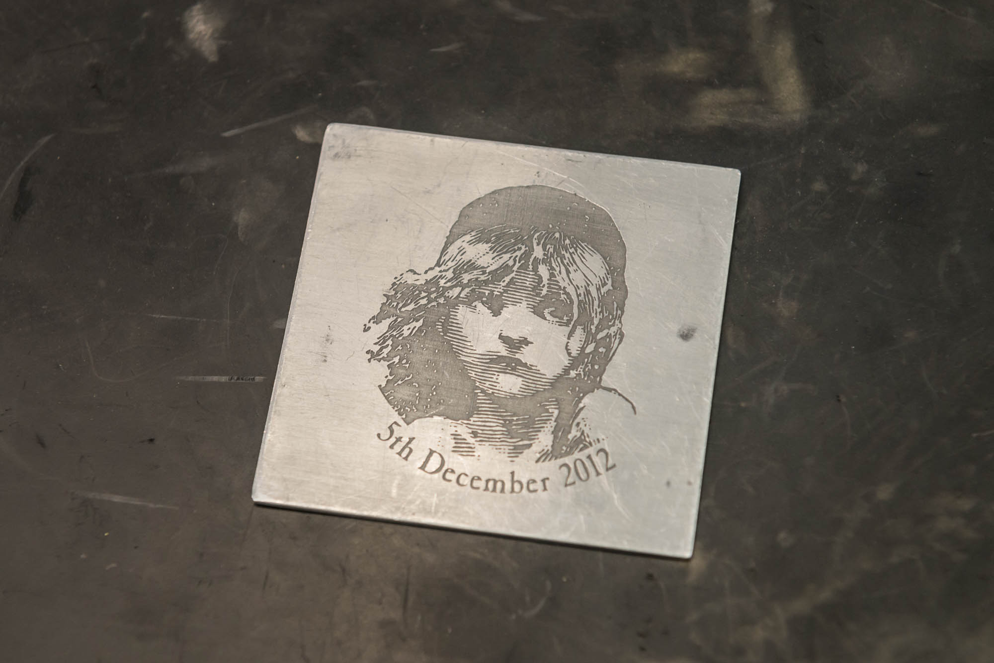Les Miserables logo, a laser engraving later etched onto goblets which were presented to the cast of the movie in 2012