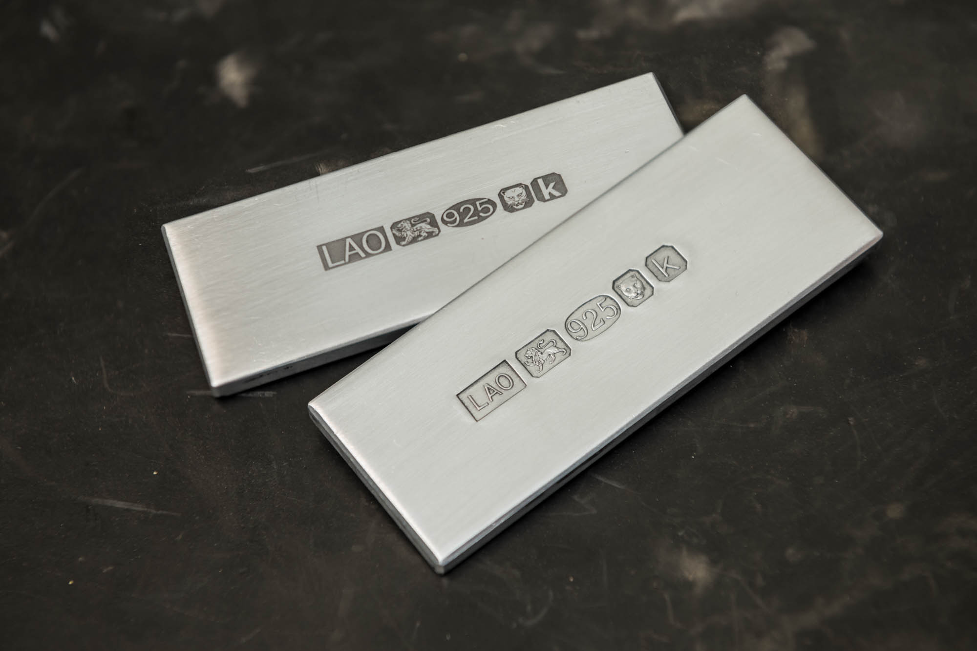 Comparison of laser and struck hallmarks (laser behind)